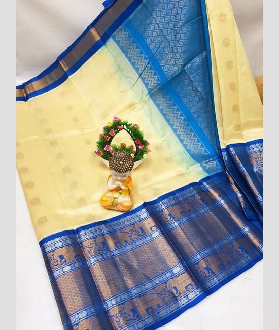 kuppadam pattu Cream - blue sarees